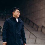asian man tourist walking outside street